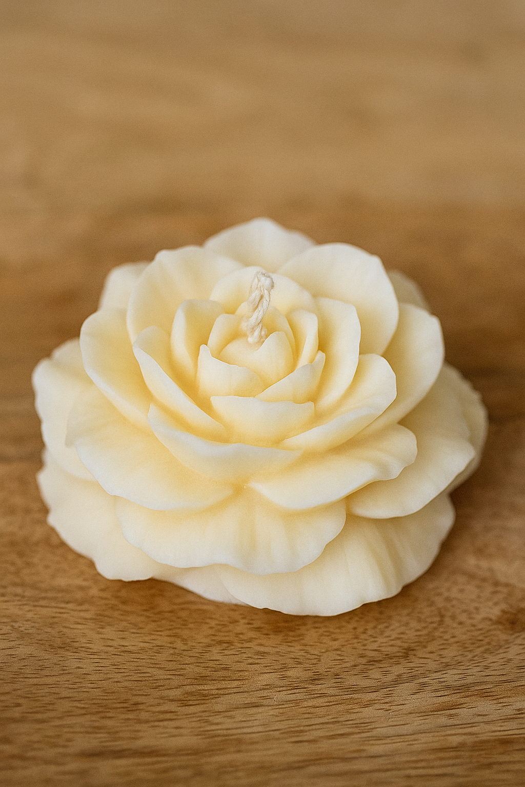 Luxury handmade pink peony soy wax candle with floral design, infused with citronella and eucalyptus oils, eco-friendly and gift-ready.