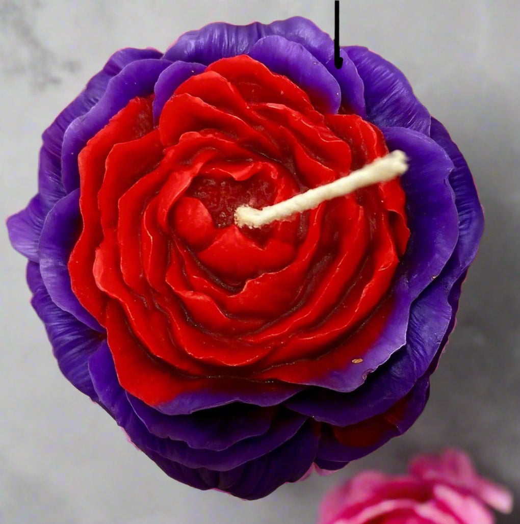 Luxury handmade pink peony soy wax candle with floral design, infused with citronella and eucalyptus oils, eco-friendly and gift-ready.